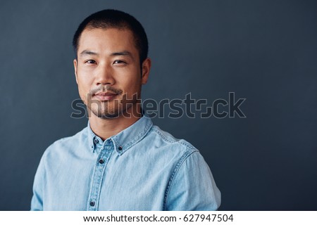 Image, Stock Photo Determined ethnic male entrepreneur walking on street