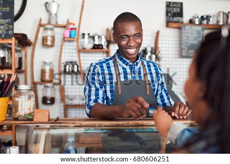 Similar – Image, Stock Photo Crop African American male browsing phone in park