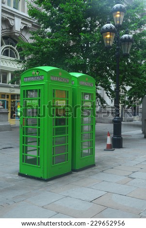 JULY, 2014 - LONDON, UK: two green phone booths in Central London