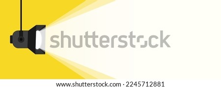 Banner spotlight background. Retro spotlight is glowing on wall. Spotlight on color background. Illuminated lamp advertising poster space for text. Spotlight shining on yellow background. Web banner