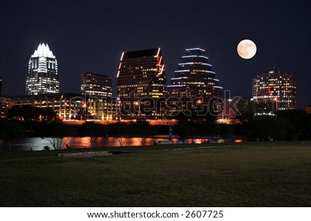 A very pretty night in Austin, Texas.  This shot was taken from across Town Lake downtown.  A very useful image for Austin related content.  The moon was adding in for effect.
