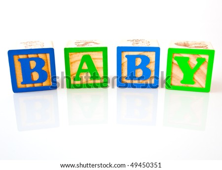 The Letters B, A, B, Y Spelling Baby With Wooden Blocks Stock Photo ...