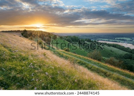 Image, Stock Photo Beacon on hill near sea at sunset