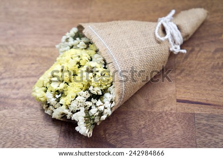Dried flower bouquet on wood table