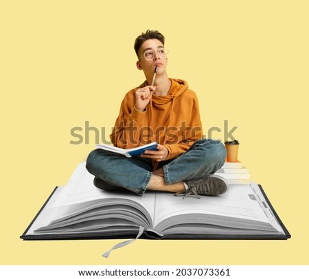 Contemporary art collage of male student sitting on notebook and thinking, making notes. Importance of education. Support online schools. Concept of online study, education, ad