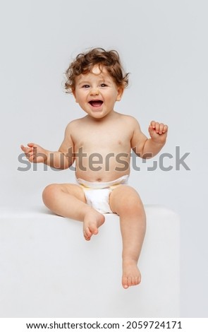 Image, Stock Photo Happy young toddler boy playing in the indoor play area