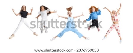Similar – Image, Stock Photo Playful little girl jumping over sea waves on a sand beach at sunset