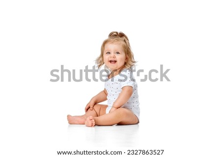 Similar – Image, Stock Photo Cute little kid sitting on his sakteboard