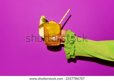 Similar – Image, Stock Photo Hand holding a glass of kefir