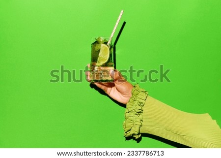 Similar – Image, Stock Photo Woman pouring cocktail in metal mug