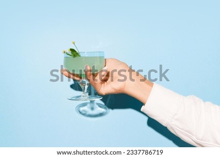 Similar – Image, Stock Photo Woman pouring cocktail in metal mug