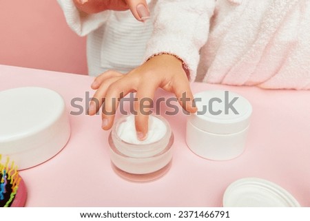 Similar – Image, Stock Photo Anonymous kid taking care of tomato plants in garden