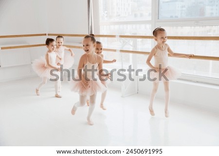 Similar – Image, Stock Photo Ballet girl posing on a turquoise background.