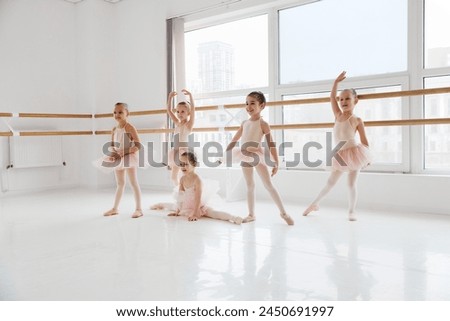 Similar – Image, Stock Photo Ballet girl posing on a turquoise background.