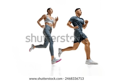 Similar – Image, Stock Photo young fit woman running away doing sport on a path in park