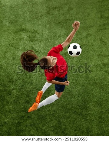 Similar – Foto Bild junger Fußballspieler läuft über den Fußballplatz