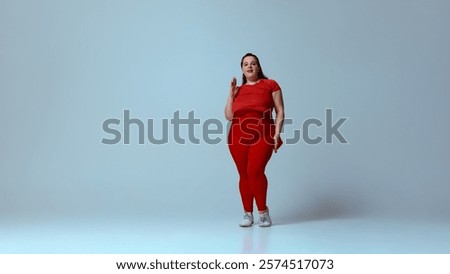 Similar – Image, Stock Photo Smiling woman dressed sportswear with rolled pilates mat in a park