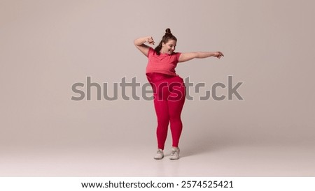 Image, Stock Photo Smiling woman dressed sportswear with rolled pilates mat in a park