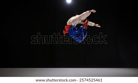 Similar – Image, Stock Photo Ukrainian man warrior dressed in a military pixel uniform stands on a white isolated background