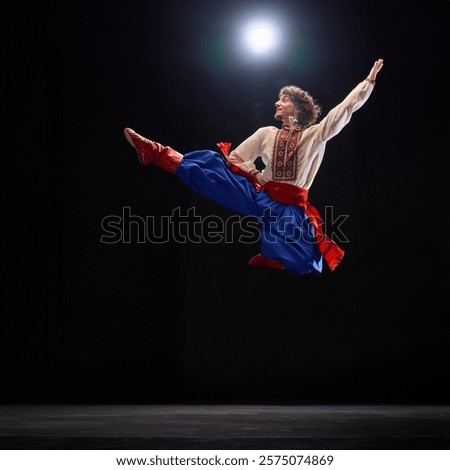 Image, Stock Photo Ukrainian man warrior dressed in a military pixel uniform stands on a white isolated background