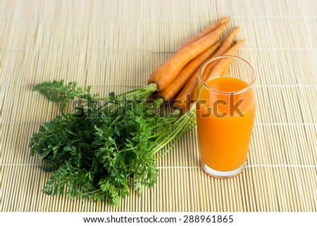 Fresh and organic carrot juice\
A glass of freshly made carrot juice.