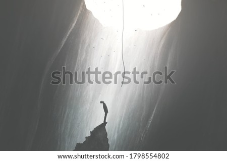 illustration of man finding a way to get out of darkness, help from the sky, surreal concept