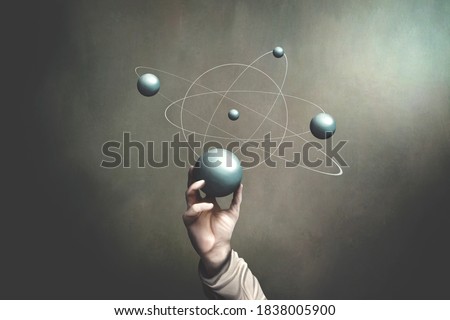 illustration of hand holding sphere that represents planets activities, science surreal concept
