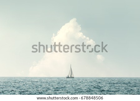 Similar – Image, Stock Photo Sailboat on sea under blue sky in daytime