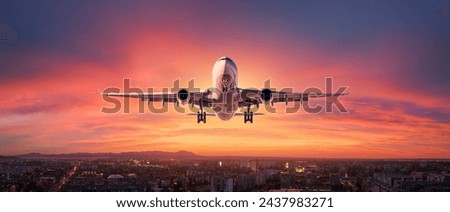 Similar – Image, Stock Photo An airplane takes off into the diffusely glowing sky