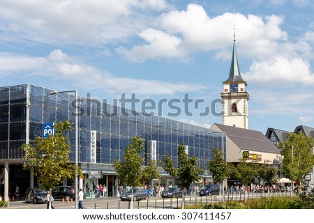 METZINGEN, GERMANY - AUGUST 18, 2015: Shops and Parking Garage at the Outlet City Metzingen, home of Hugo Boss