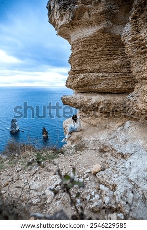 Similar – Image, Stock Photo Female tourist contemplating picturesque landscape