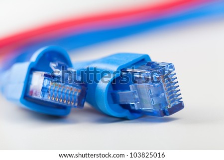 A couple of blue Rj45 network cables. Shallow Depth of Field, macro.