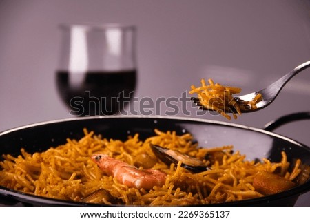 Similar – Image, Stock Photo Pan with tasty fideua dish on table