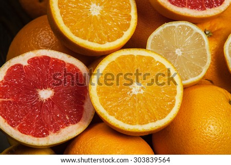 Various citrus fruits.Mixed citruses, oranges, lemon, grapefruit. Fresh citrus fruits background.