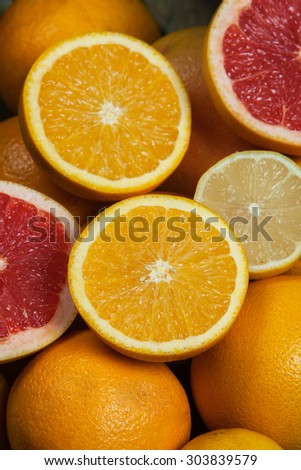 Various citrus fruits.Mixed citruses, oranges, lemon, grapefruit. Fresh citrus fruits background.