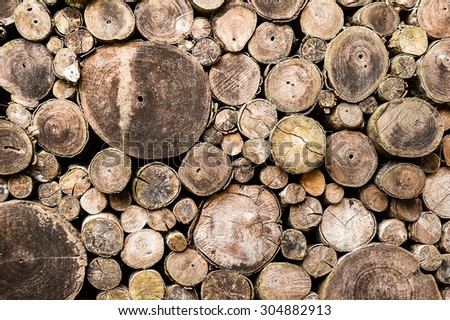 Stacked wood pine timber for construction buildings Background, Background of stacked timber logs.