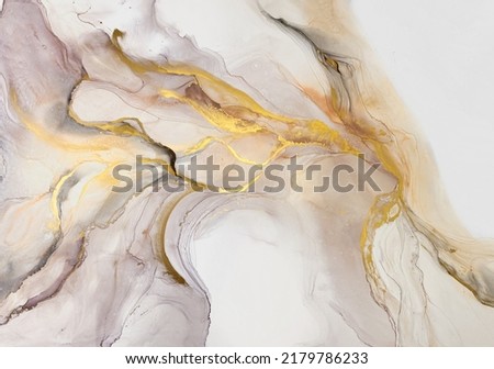 Abstract art with gold — pink-purple background with beautiful smudges and stains made with alcohol ink. Fragment of art with pink texture resembles stone, watercolor or aquarelle.