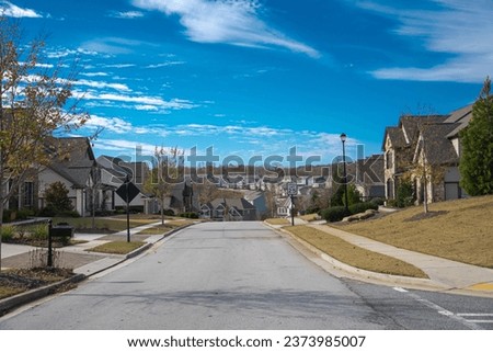 Similar – Image, Stock Photo Steep street with wooden entrance door and left street sign, La Orotava, Tenerife, Canary Islands, Spain