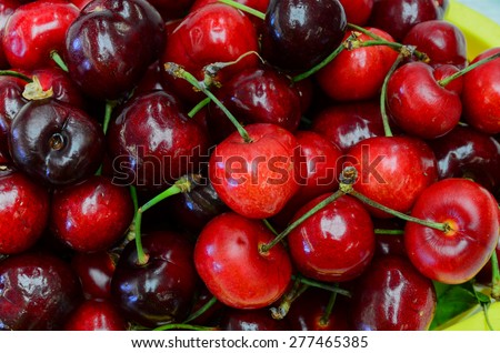 A basket of organically grown bing cherries in a local fruit market at Ellensburg, Washington, US