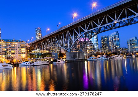 Granville Bridge along False Creek at Night in Vancouver BC. Vancouver is the third most populous metropolitan area and is the most ethnically diverse cities in Canada.