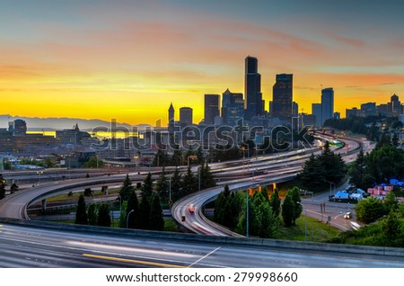 Seattle skylines and highway traffic in the sunset. The view from Rizal Park in Seattle, Washington, US
