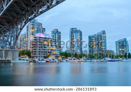 Granville Bridge along False Creek at Night in Vancouver BC. Vancouver is the third most populous metropolitan area and is the most ethnically diverse cities in Canada.