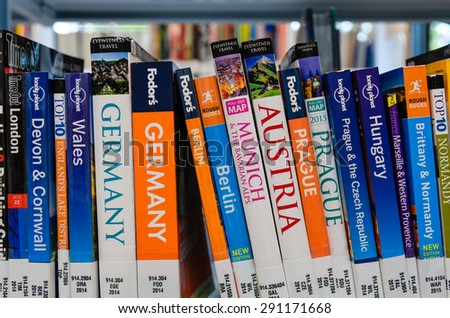 WASHINGTON, USA - JUNE 27 - A bookshelf of European travel books in King County Library System (KCLS). This is library system serving the residents of King County, Washington, United States.