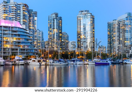 Vancouver BC Canada Skylines next to Granville Bridge along False Creek at Night. Vancouver is the third most populous metropolitan area and is the most ethnically diverse cities in Canada