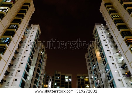 Looking up at Singapore\'s skyscraper/skylines in Eunos Area at night