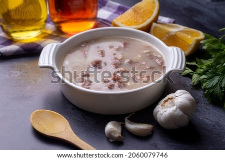Traditional delicious Turkish food, Turkish traditional tripe soup; iskembe corbasi and offal soup, Turkish Meat Soup Kelle Paca (Turkish name; Kelle paca corbasi) Stock fotó © 
