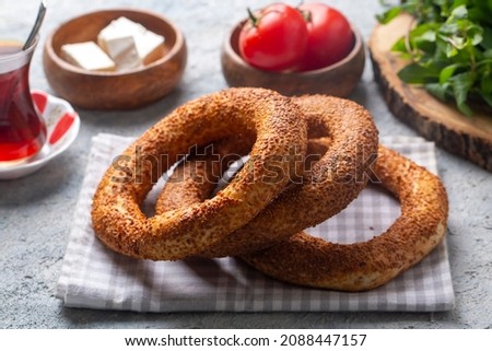 Turkish fast food bagel called Simit. Turkish bagel Simit with sesame. Bagel is traditional Turkish bakery food. Turkish name; simit - gevrek