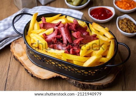 French fries and sausage fries platter (Turkish name; patates ve sosis kizartmasi) Zdjęcia stock © 