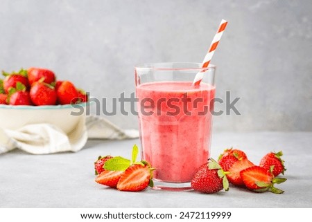 Similar – Image, Stock Photo Strawberry smoothie in a botle with pink background and pink paper straws.