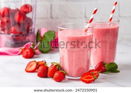 Image, Stock Photo Strawberry smoothie in a botle with pink background and pink paper straws.